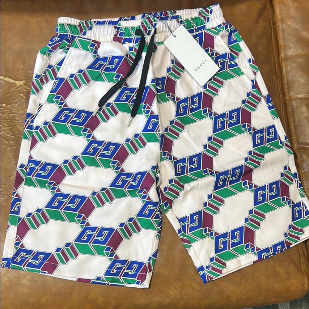 Gucci White, Green, and Purple Board Shorts with Geometric Design